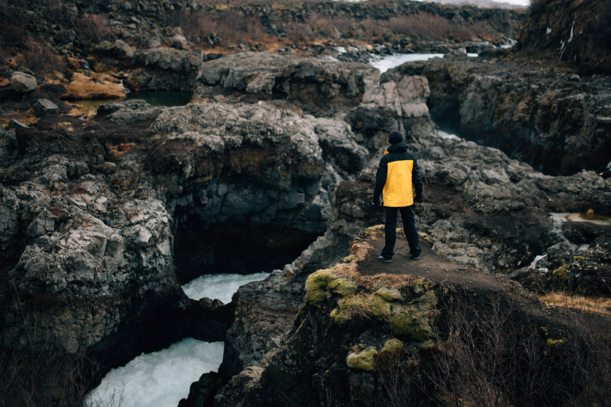 Barnafoss waterfall runs in the middle of a lava field in West Iceland