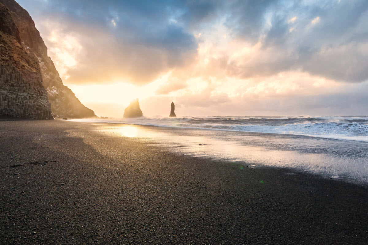 Sunset at Reynisfjara black sand beach in South Iceland