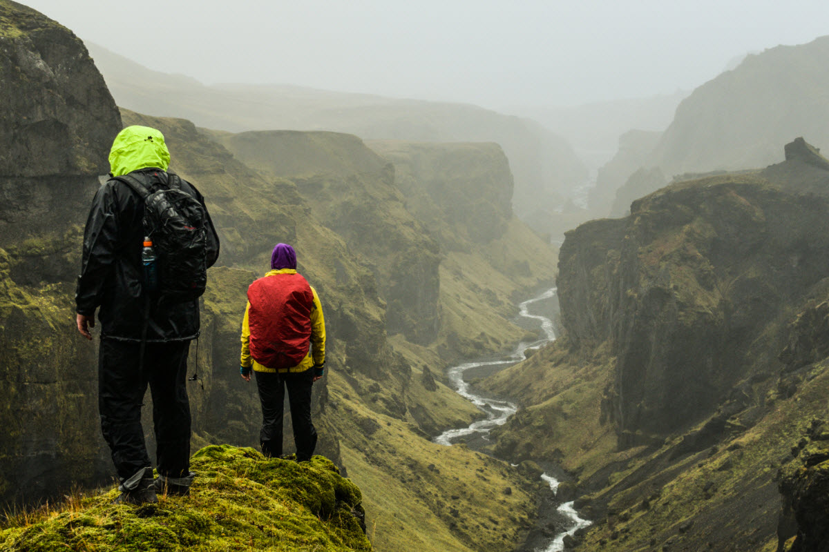 Hiking over Hvannagil gorge in Thorsmork in the highland of Iceland